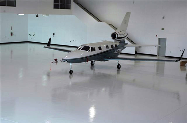 PSX 700 used as a hangar floor finish coat system by KTM Coatings, San Diego, CA