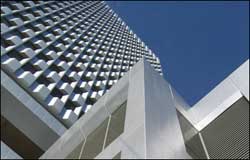 Office tower coated with Precision Coatings metallic aliphatic polyurethane coating system which is LEED compliant.
